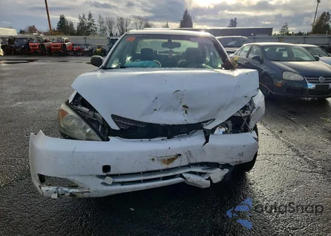 2003 Toyota Camry Le z USA, uszkodzony, nr VIN 4T1BE32K13U122126